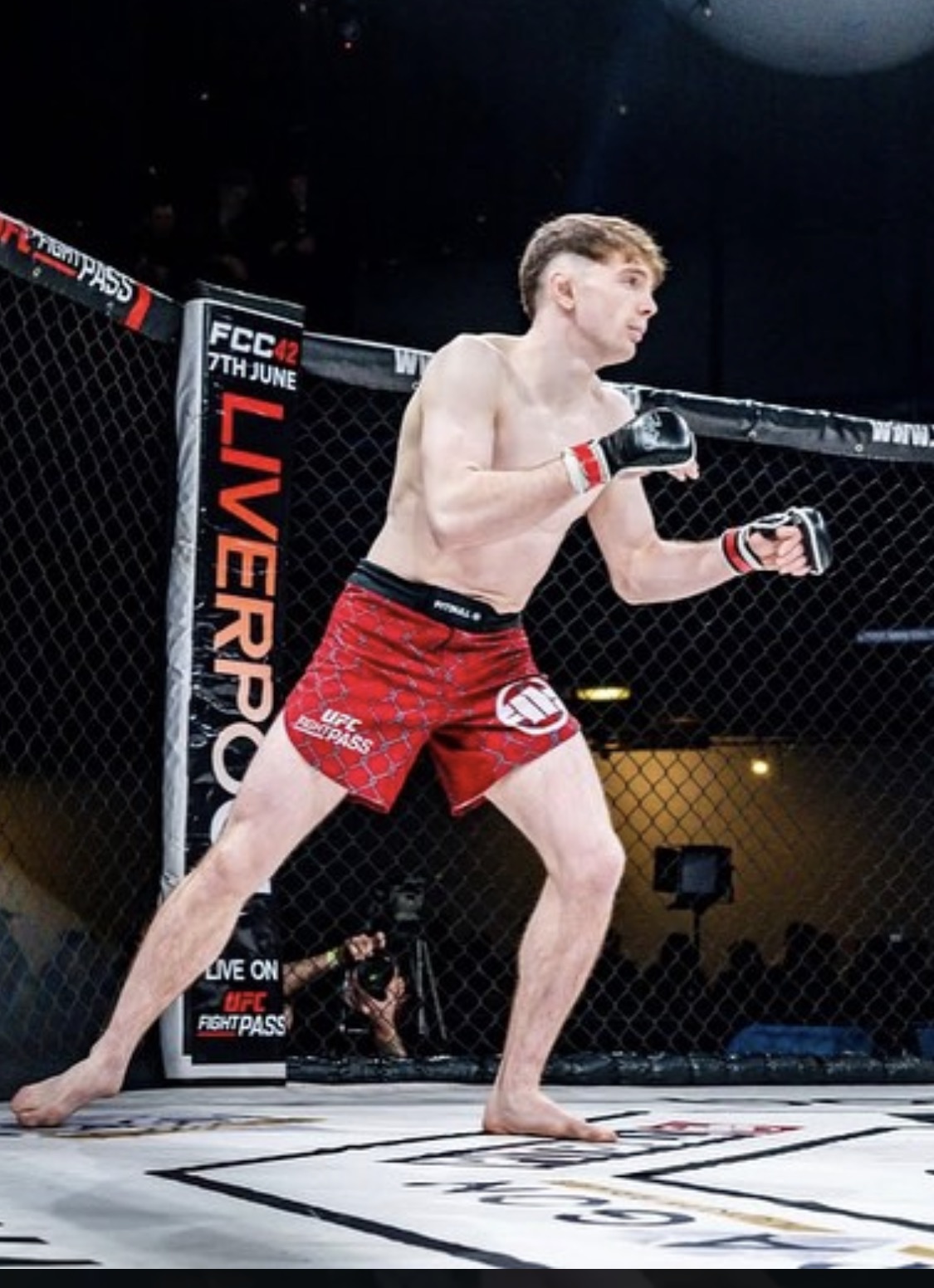Reece Parr fighting in the cage at FCC in Liverpool