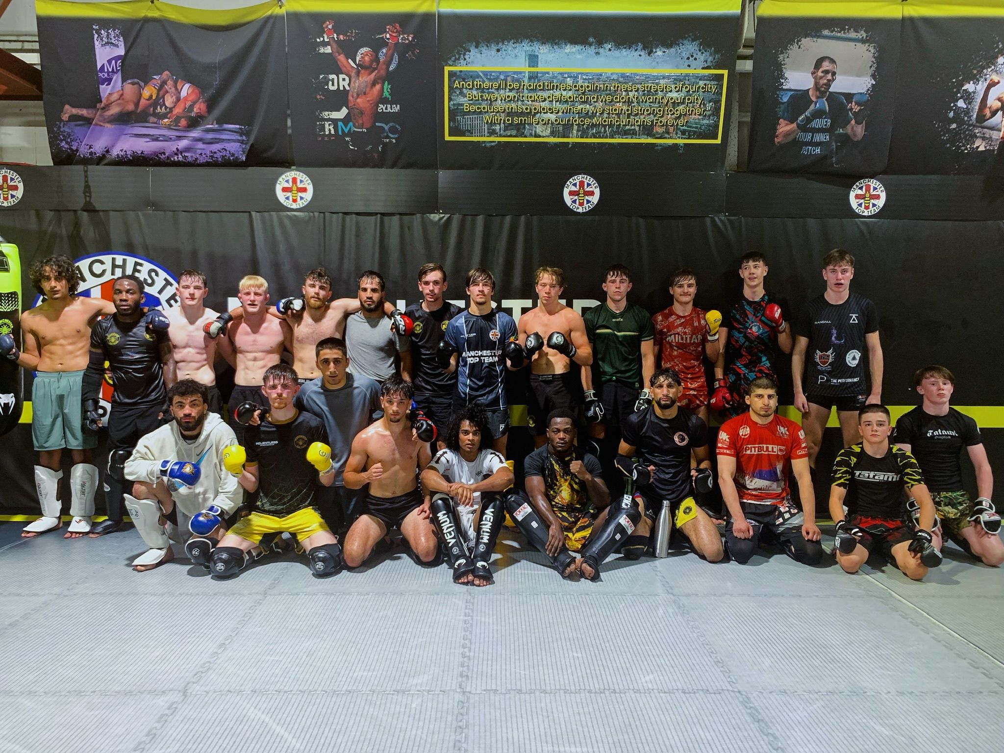 Manchester Top Team amateur fighters group photo in the gym